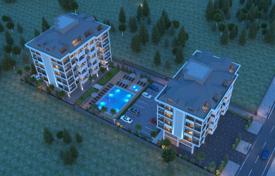 Просторные апартаменты со студией в новой качественной резиденции с бассейнами и садом, в 200 метрах от пляжа, Аланья, Турция за $494 000