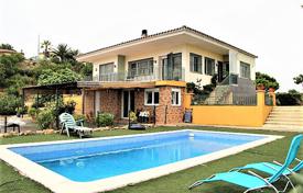 Вилла с двумя отдельными апартаментами, бассейном и видом на горы в одном из лучших районов Льорет‑де-Мар, Испания за 429 000 €