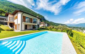 Комфортабельная вилла с частным садом, бассейном, парковкой, террасой и видом на озеро, Тремеццо, Италия за $3 305 000