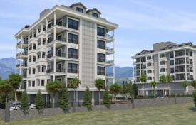 Различные апартаменты в новой качественной резиденции с бассейнами и садом, в 200 метрах от пляжа, Аланья, Турция за $230 000