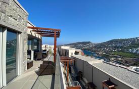 Меблированные квартиры в Ялыкавак Бодрум с видом на море, балконом и террасой, в элитном комплексе с песчаным пляжем и причалом, рестораном за $642 000