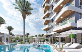 Двухкомнатная квартира в новой резиденции с бассейнами, теннисным кортом и круглосуточной охраной, Махмутлар, Турция за $171 000