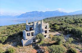 Трехэтажный дом на стадии строительства с садом и живописным видом в 500 метрах от моря, Каламата, Греция за 380 000 €