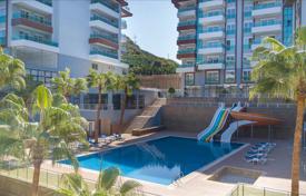 Меблированная двухкомнатная квартира в резиденции с бассейнами и теннисным кортом, в 400 метрах от моря, Каргыджак, Турция за $153 000
