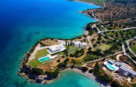 Уединенная элитная вилла с собственным пляжем, бассейном и двумя гостевыми домами на полуострове, Порто Хели, Греция за 26 000 € в неделю