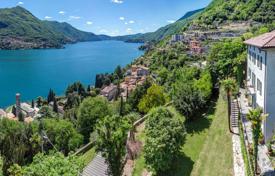 Четырёхуровневая вилла с садом и видом на озеро Комо в Карате-Урио, Италия за 1 390 000 €