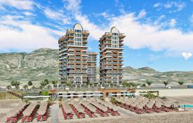 Апартаменты с хорошей инфраструктурой прямо у моря, Махмутлар, Турция за $296 000
