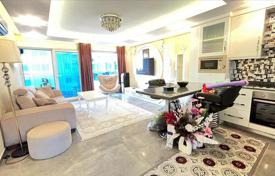 Меблированная двухкомнатная квартира в резиденции с бассейном, в 100 метрах от моря, Кестель, Турция за $168 000