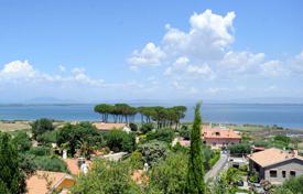 Современная вилла с садом и видом на озеро, Гроссето, Италия за 750 000 €