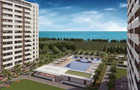 Новая резиденция с аквапарком, бассейнами и теннисным кортом в 150 метрах от пляжа Мерсин, Турция за От $102 000